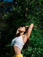 Outdoor yoga practice near greenery
